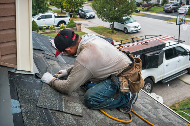 Professional Roof Leak Repair technician working in Girard, KS